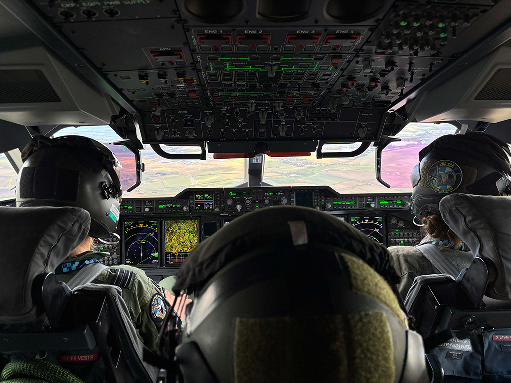 Photo: Image of the Atlas flight deck, taken from behind the centre seat, while in flight, looking forward through the windows.